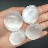 Silver selenite palm stone