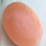 Red selenite palm stone