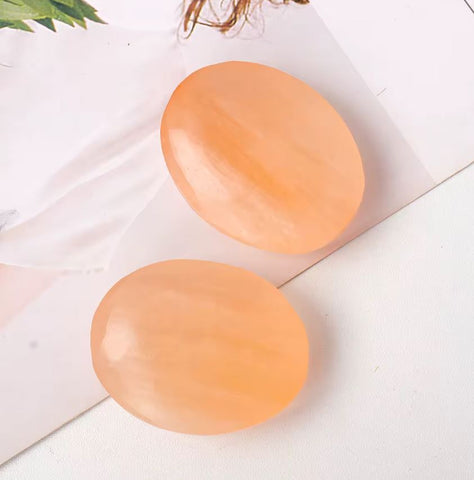 Red selenite palm stone