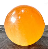 Large peach selenite sphere